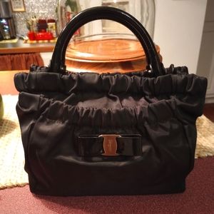 (SOLD)Salvatore Ferragamo Vera Bow Handbag in Black Nylon/Patent Leather Trim